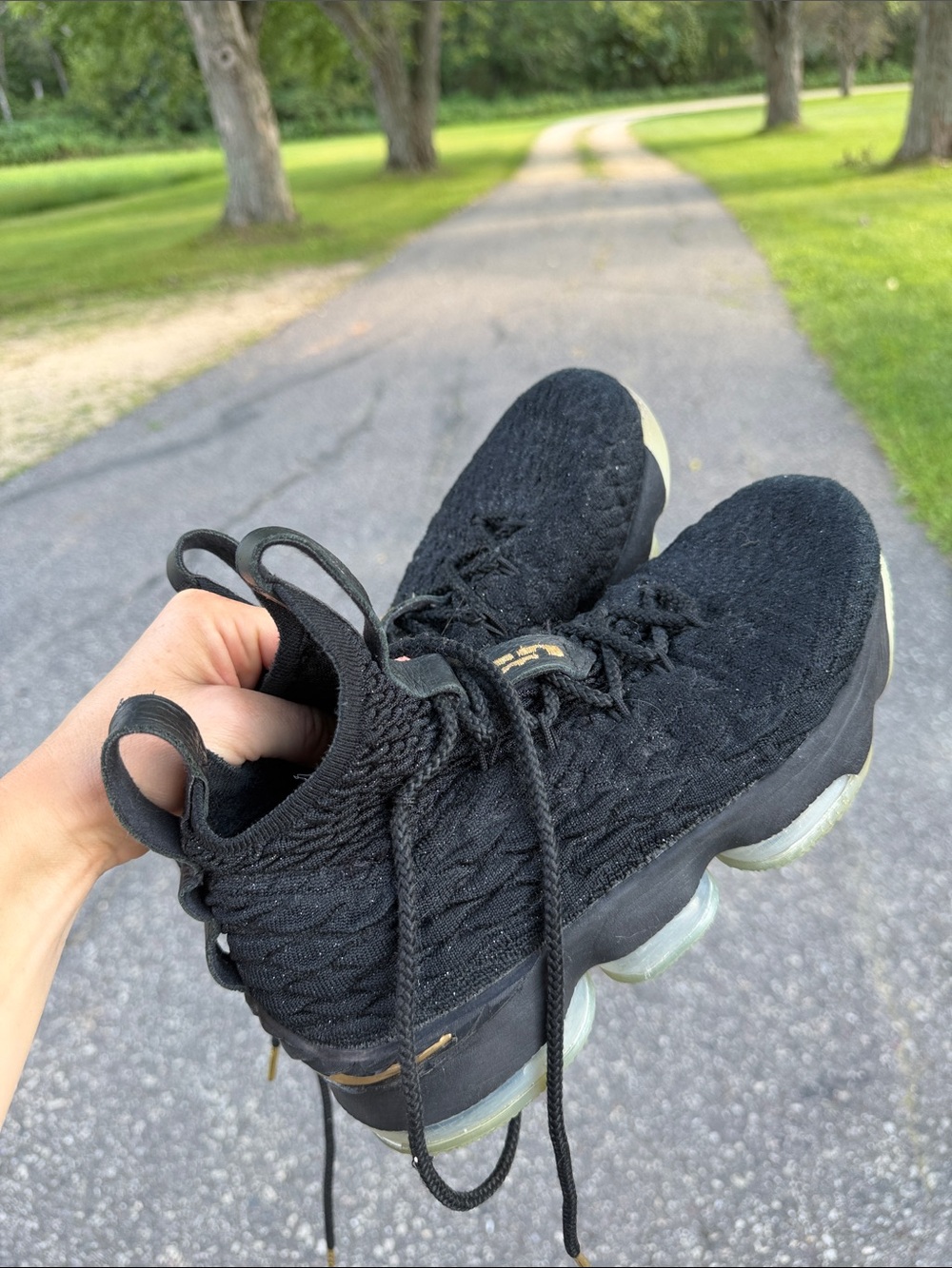 Nike Women's Black Knit Athletic Sneakers with Gold Accents